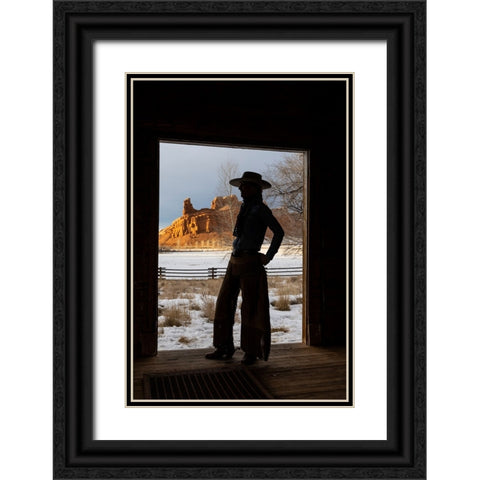 USA- Shell- Wyoming. Hideout Ranch with cowgirl silhouetted in doorway of log cabin.  Black Ornate Wood Framed Art Print with Double Matting by Gulin, Darrell