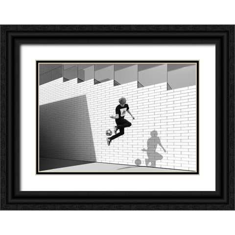 Boy With Football Black Ornate Wood Framed Art Print with Double Matting by Schuster, Inge