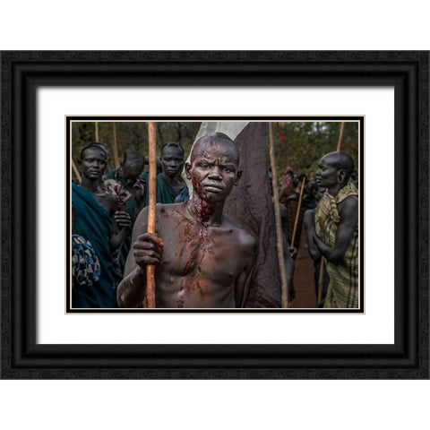 The Winner Of A Donga Fight In Ethiopia. Black Ornate Wood Framed Art Print with Double Matting by Inazio Kuesta, Joxe
