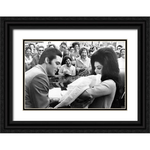Elvis Presley and Priscilla with Lisa Marie-1968 Black Ornate Wood Framed Art Print with Double Matting by Vintage Music Archive