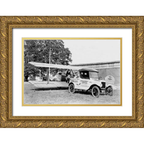 Ford Towing Plane Gold Ornate Wood Framed Art Print with Double Matting by Unknown