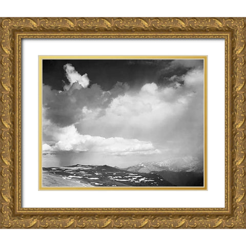 Mountain tops, low horizon, dramatic clouded sky, in Rocky Mountain National Park, Colorado, ca. 194 Gold Ornate Wood Framed Art Print with Double Matting by Adams, Ansel