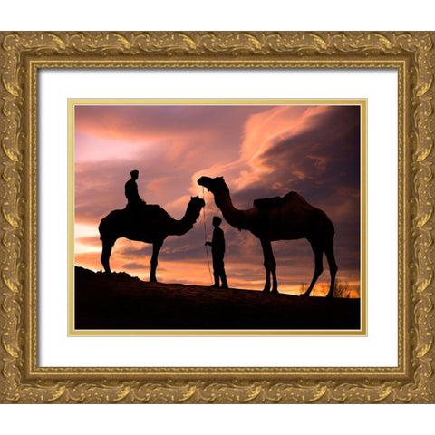 Young men and camels at sunset in the Rajasthan desert-Pushkar-India Gold Ornate Wood Framed Art Print with Double Matting by SMO