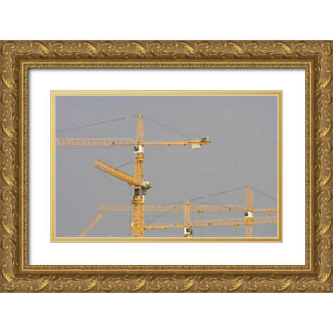 UAE, Dubai, Marina Yellow construction cranes Gold Ornate Wood Framed Art Print with Double Matting by Young, Bill