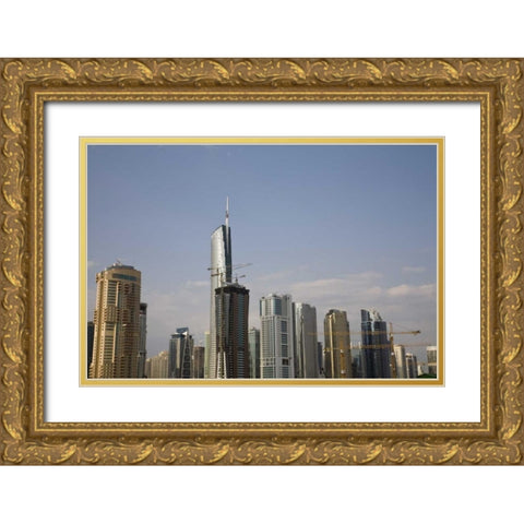 UAE, Dubai Construction amid skyscrapers Gold Ornate Wood Framed Art Print with Double Matting by Young, Bill