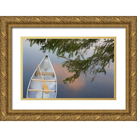 Canada, Quebec, Eastman Canoe on lake at sunset Gold Ornate Wood Framed Art Print with Double Matting by Delisle, Gilles