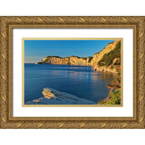 Canada-Quebec-Forillon National Park Limestone cliffs along Gulf of St Lawrence at sunrise Gold Ornate Wood Framed Art Print with Double Matting by Jaynes Gallery