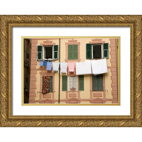 Italy, Camogli Laundry hangs across a building Gold Ornate Wood Framed Art Print with Double Matting by Kaveney, Wendy