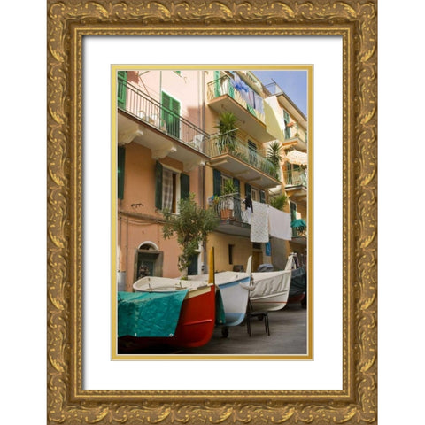Italy, Manarola Boats stored on the streets Gold Ornate Wood Framed Art Print with Double Matting by Kaveney, Wendy
