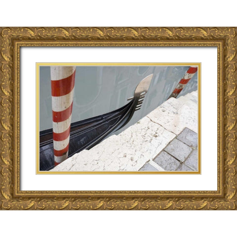 Italy, Venice Gondola and posts Gold Ornate Wood Framed Art Print with Double Matting by Delisle, Gilles