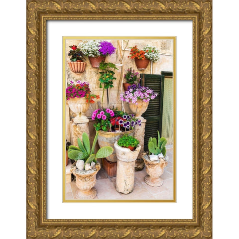 Italy-Apulia-Metropolitan City of Bari-Monopoli Flowers in planters outside a stone building Gold Ornate Wood Framed Art Print with Double Matting by Wilson, Emily