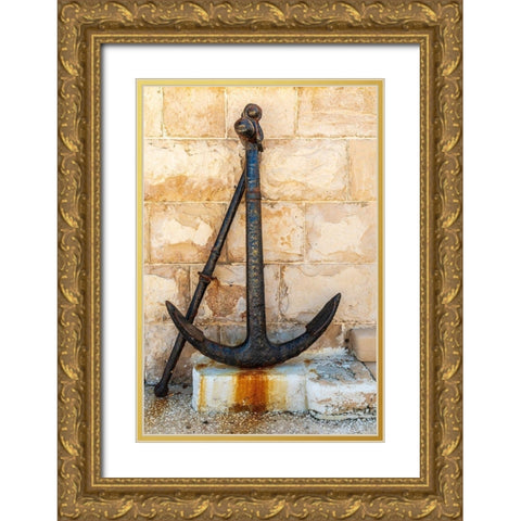 Italy-Apulia-Metropolitan City of Bari-Giovinazzo Old rusted anchor in front of a stone wall Gold Ornate Wood Framed Art Print with Double Matting by Wilson, Emily