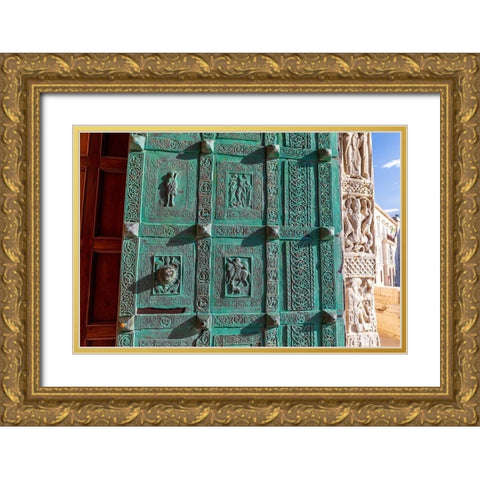 Italy-Apulia-Trani-Trani San Nicola Pellegrino cathedral Intricately carved door Gold Ornate Wood Framed Art Print with Double Matting by Wilson, Emily