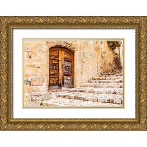 Italy-Basilicata-Province of Matera-Matera Old wooden door in a stone wall above stone steps Gold Ornate Wood Framed Art Print with Double Matting by Wilson, Emily