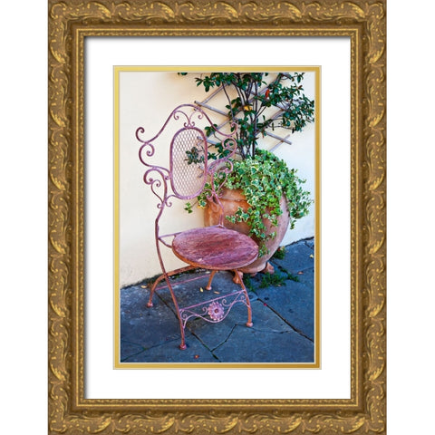 Italy-Tuscany-Lucca Decorative chair and potted plant outside a shop Piazza dellAnfiteatro Romano Gold Ornate Wood Framed Art Print with Double Matting by Eggers, Julie