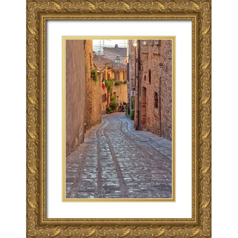 Italy- Umbria. Cobblestone street in the town of Spello. Gold Ornate Wood Framed Art Print with Double Matting by Eggers, Julie