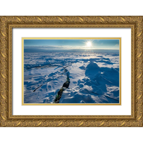 Norway Icescape at 84 degrees north-crack in ice with sunburst Gold Ornate Wood Framed Art Print with Double Matting by Hopkins, Cindy Miller