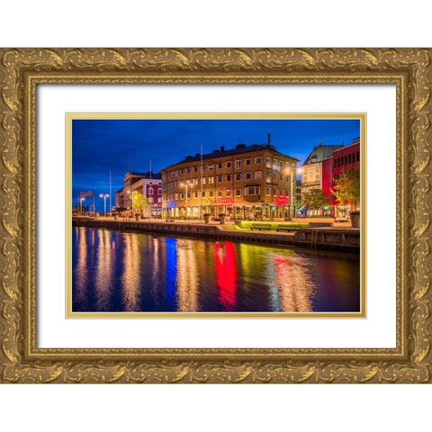 Sweden-Lake Vattern Area-Jonkoping-renovated harbor area along Munksjon Bay-dusk Gold Ornate Wood Framed Art Print with Double Matting by Bibikow, Walter