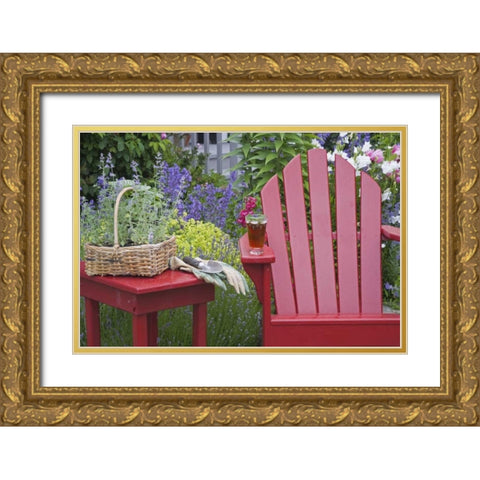 Ice tea rests on red chair while gardening Gold Ornate Wood Framed Art Print with Double Matting by Paulson, Don