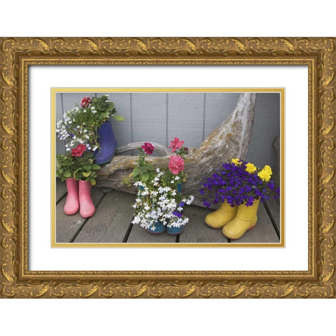 Alaska, Homer Rubber boots used as flower pots Gold Ornate Wood Framed Art Print with Double Matting by Flaherty, Dennis