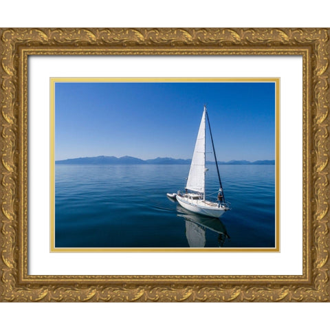 Alaska-Aerial view of Gulf 32 pilothouse boat motoring and sailing in calm waters of Frederick Sound Gold Ornate Wood Framed Art Print with Double Matting by Souders, Paul