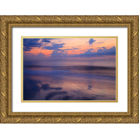 USA- Georgia- Tybee Island. Sunrise with clouds and reflections along the coast. Gold Ornate Wood Framed Art Print with Double Matting by Wells, Joanne