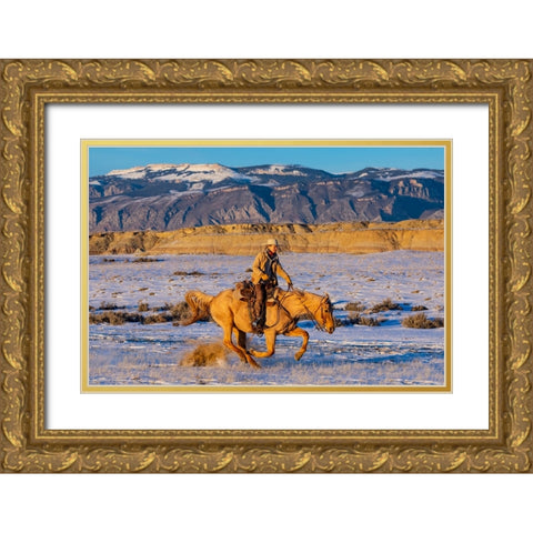 USA- Shell- Wyoming. Hideout Ranch cowgirl riding fast snows.  Gold Ornate Wood Framed Art Print with Double Matting by Gulin, Darrell