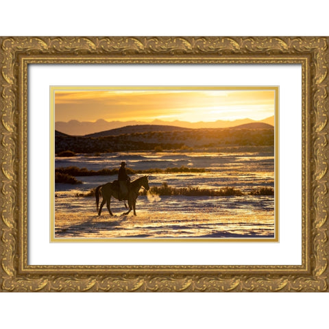 USA- Shell- Wyoming. Hideout Ranch sunset and silhouetted cowboy.  Gold Ornate Wood Framed Art Print with Double Matting by Gulin, Darrell