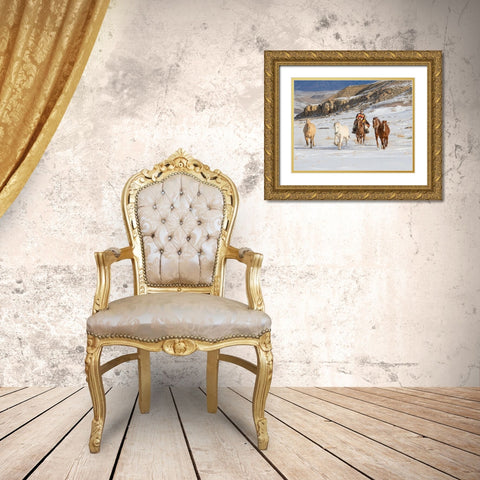 USA- Shell- Wyoming. Hideout Ranch cowboy riding and herding horses in snow.  Gold Ornate Wood Framed Art Print with Double Matting by Gulin, Darrell
