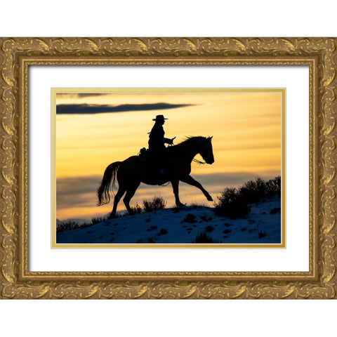 USA- Shell- Wyoming. Hideout Ranch cowgirl silhouetted on horseback at sunset.  Gold Ornate Wood Framed Art Print with Double Matting by Gulin, Darrell
