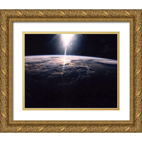 Sunlight over Earth as seen by Discovery crew Gold Ornate Wood Framed Art Print with Double Matting by NASA