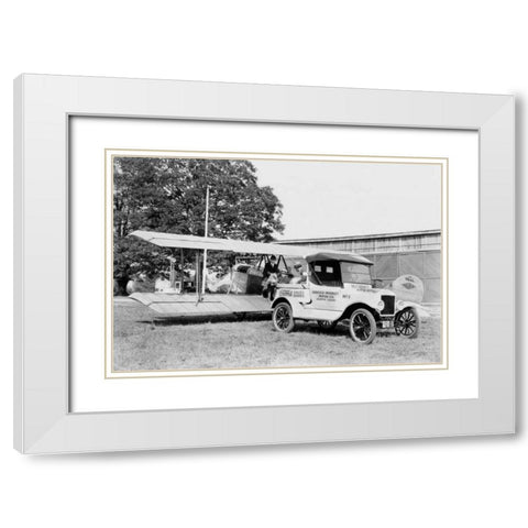 Ford Towing Plane White Modern Wood Framed Art Print with Double Matting by Unknown