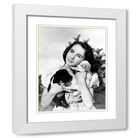 Elizabeth Taylor with puppies White Modern Wood Framed Art Print with Double Matting by Hollywood Photo Archive
