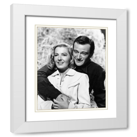 John Wayne with Jean Arthur White Modern Wood Framed Art Print with Double Matting by Hollywood Photo Archive