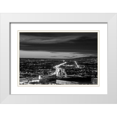 Dusk skyline view of Los Angeles California looking west over the Santa Monica freeway White Modern Wood Framed Art Print with Double Matting by Highsmith, Carol