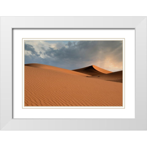 Sand dunes glow orange at sunset in the Sahara Desert. White Modern Wood Framed Art Print with Double Matting by Sederquist, Betty