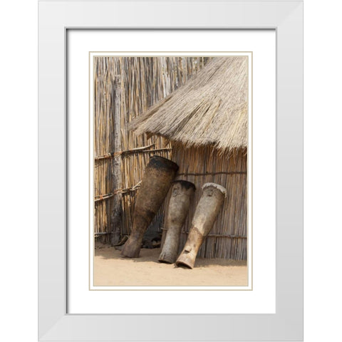 Namibia, Caprivi Strip Tribal drums lean on hut White Modern Wood Framed Art Print with Double Matting by Kaveney, Wendy