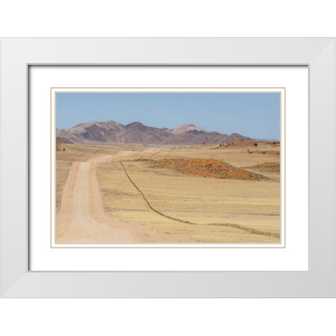 Namibia, Namib Desert Road and fence in desert White Modern Wood Framed Art Print with Double Matting by Kaveney, Wendy