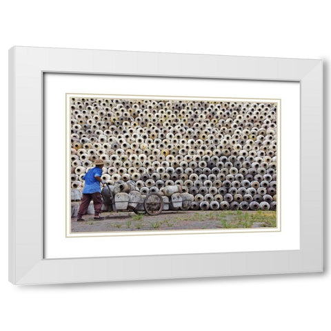 Man pushing cart loaded with wine jars to the big pile in a winery-Zhejiang Province-China White Modern Wood Framed Art Print with Double Matting by Su, Keren