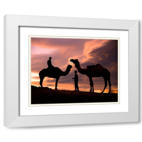Young men and camels at sunset in the Rajasthan desert-Pushkar-India White Modern Wood Framed Art Print with Double Matting by SMO