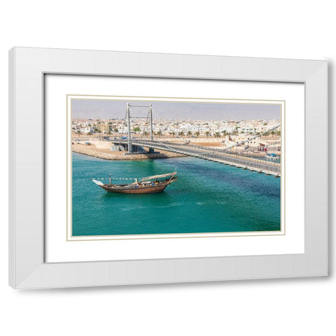 Middle East-Arabian Peninsula-Oman-Al Batinah South-Dhow passing under a suspension bridge White Modern Wood Framed Art Print with Double Matting by Wilson, Emily M.