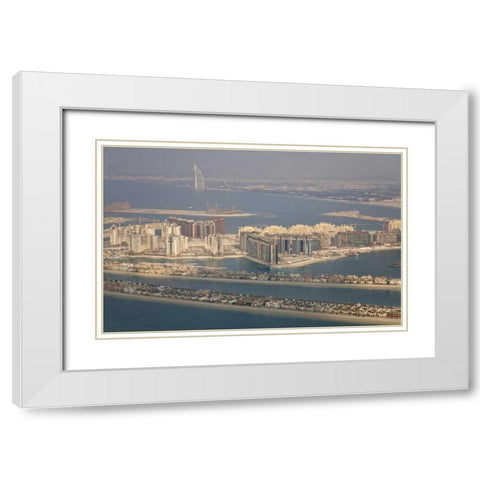 UAE, Dubai Artificial islands line the bay White Modern Wood Framed Art Print with Double Matting by Young, Bill