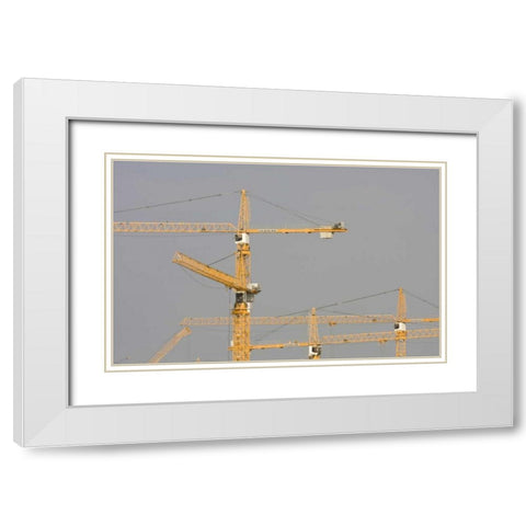 UAE, Dubai, Marina Yellow construction cranes White Modern Wood Framed Art Print with Double Matting by Young, Bill