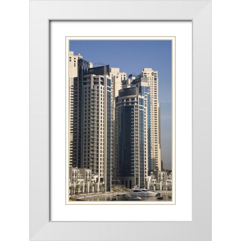 UAE, Dubai Marina towers with boats at anchor White Modern Wood Framed Art Print with Double Matting by Young, Bill