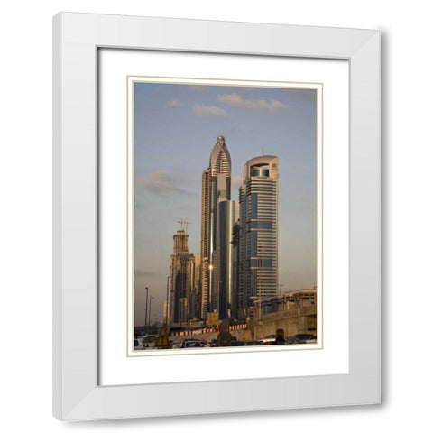UAE, Dubai Towers along Sheik Zayed Road White Modern Wood Framed Art Print with Double Matting by Young, Bill