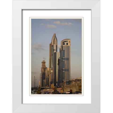 UAE, Dubai Towers along Sheik Zayed Road White Modern Wood Framed Art Print with Double Matting by Young, Bill
