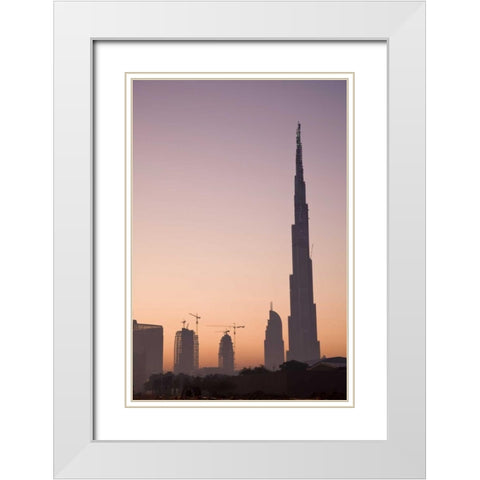 UAE, Dubai Cityscape at sunrise White Modern Wood Framed Art Print with Double Matting by Young, Bill