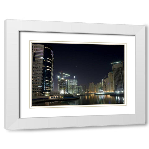 UAE, Dubai Towers on marina at night White Modern Wood Framed Art Print with Double Matting by Young, Bill