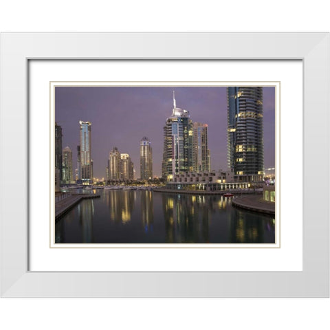 UAE, Dubai, Marina Lights reflect on marina White Modern Wood Framed Art Print with Double Matting by Young, Bill
