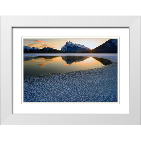 Snow crystals rim a lone break in the ice on Vermilion Lakes on a cold Banff National Park winter mo White Modern Wood Framed Art Print with Double Matting by Steve Mohlenkamp
